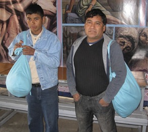 men_with_bags